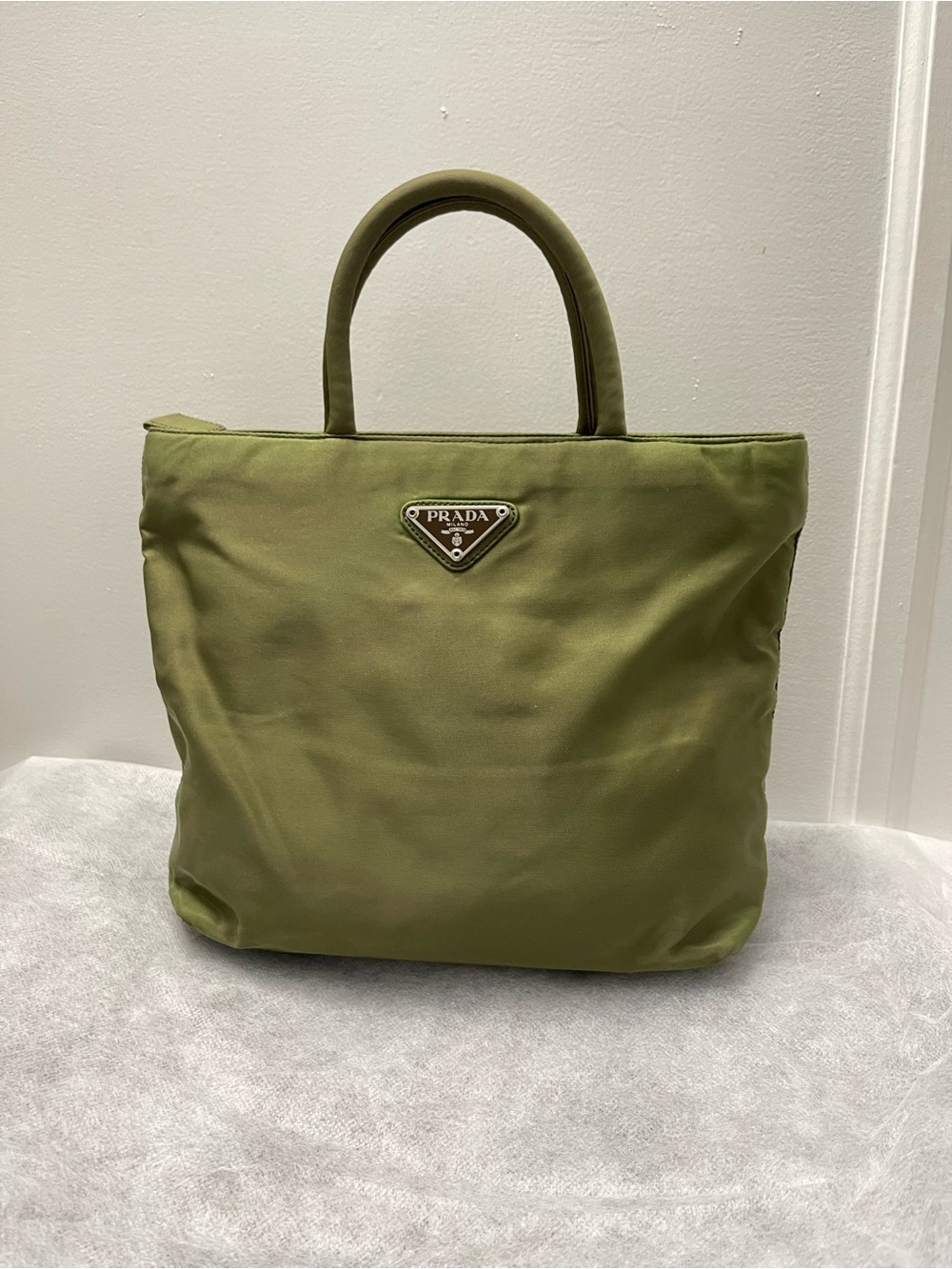 Prada Olive Tote with Triangular Logo Plaque
100% authentic.